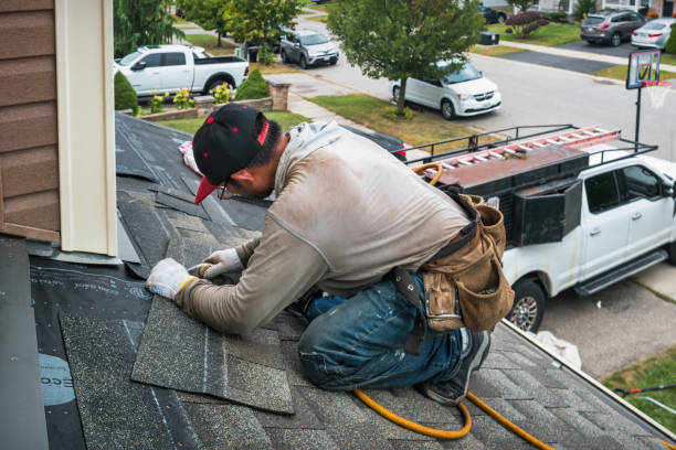 Professional Roof Replacement technician working in Brussels, WI